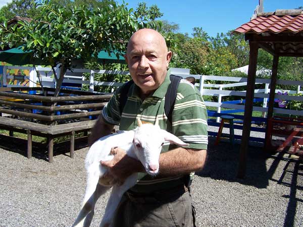 image of Alvaro holding goat